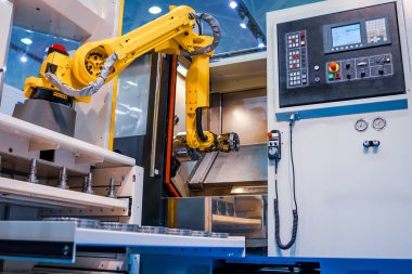 Robotik Kol üretimi modern endüstriyel teknolojiyi temsil ediyor. Otomatik üretim hücresi.