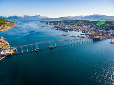 Bridge of city Tromso, Norway aerial photography. Tromso is considered the northernmost city in the world with a population above 50,000. clipart