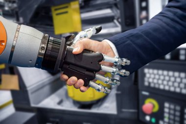 Android robot ile tokalaşırken işadamı el.