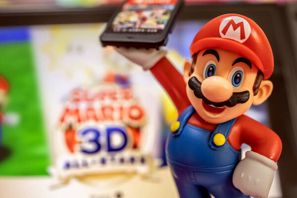 MOSCOW, RUSSIA - October 3, 2020: Super Mario Bros figure character.Super Mario is a Japanese platform video game series and media franchise created by Nintendo and featuring their mascot, Mario.