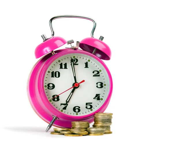Larm Uhr mit Münzen — kostenloses Stockfoto