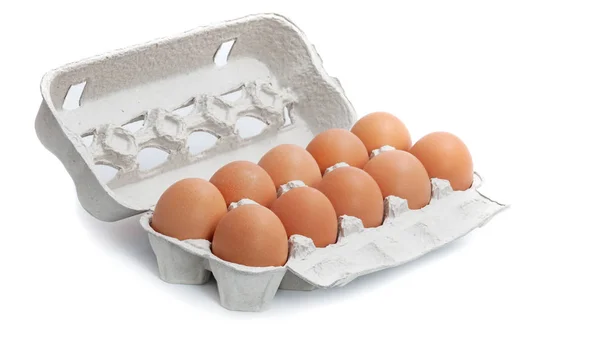 Eggs in egg carton box package isolated — Free Stock Photo