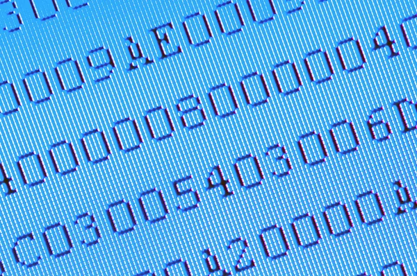 Numeri su schermo del computer blu macro — Foto Stock