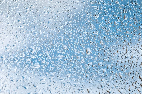 Wassertropfen auf Fensterglas — Stockfoto