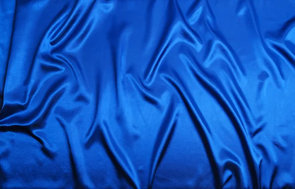 Niebieska tkanina jedwabna tekstura lub tło — Zdjęcie stockowe