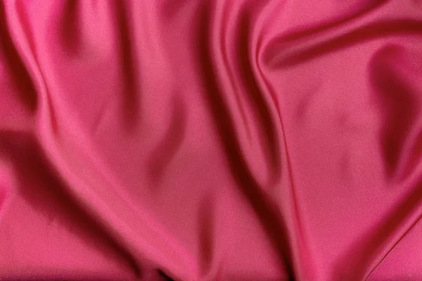 Текстура фону червоних тканин — стокове фото