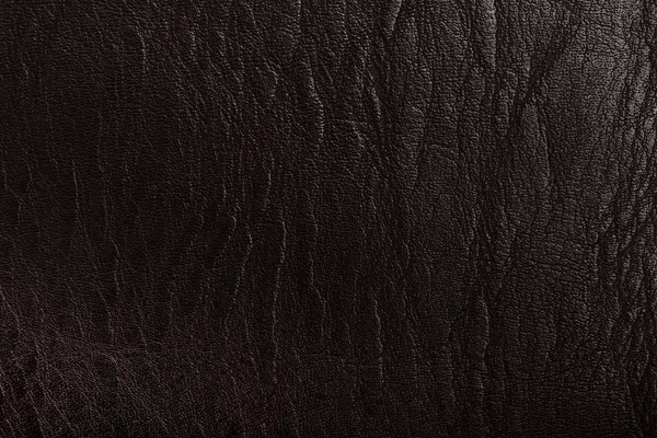 Фон темно-коричневої шкіри текстури — стокове фото