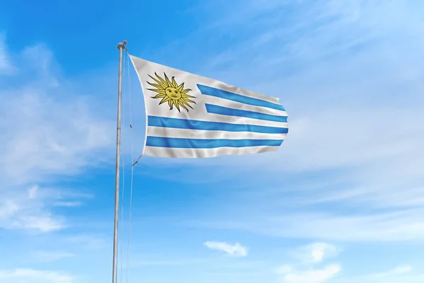 Bandera de Uruguay sobre fondo cielo azul —  Fotos de Stock