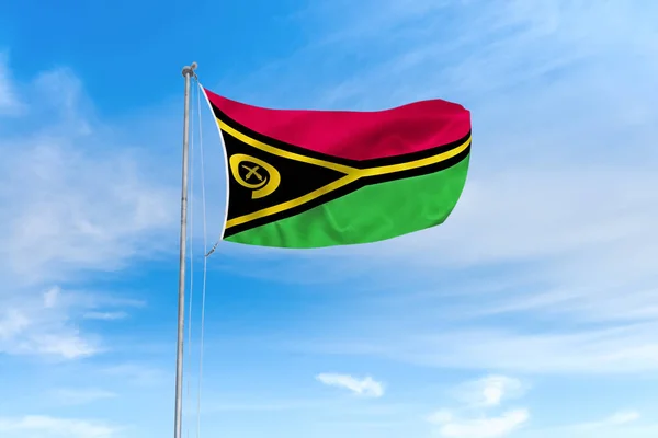 Vanuatu vlag over blauwe hemel achtergrond — Stockfoto