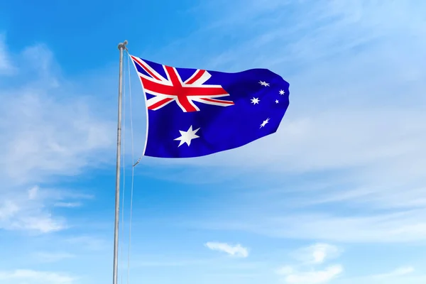 Australien flagga över blå himmel bakgrund — Stockfoto