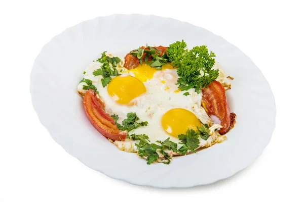 Fried eggs in plate isolated — Stock Photo, Image