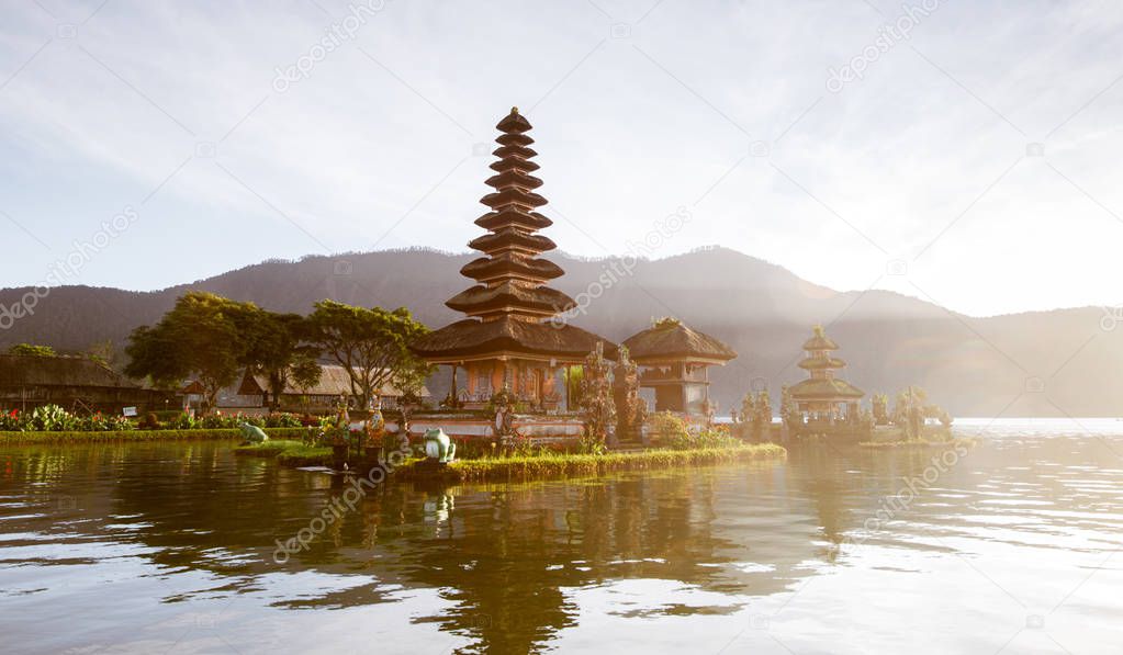 famous place on the island of Bali, a temple on the lake. Beautiful scenery at dawn in Indonesia