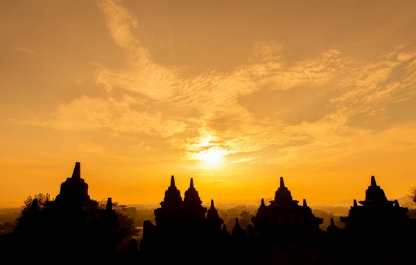 Borobudur temple sunrise, stupas are Buddhist