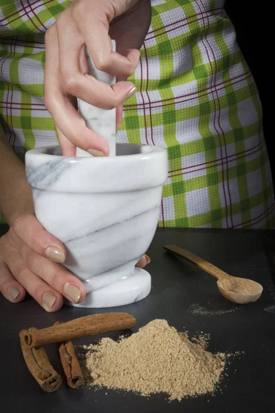 Female Hands Grind Cinnamon Sticks Mortar — Stock Photo, Image