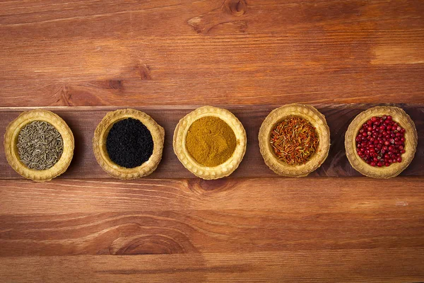 Spices Tartlets Wooden Background — Stock Photo, Image