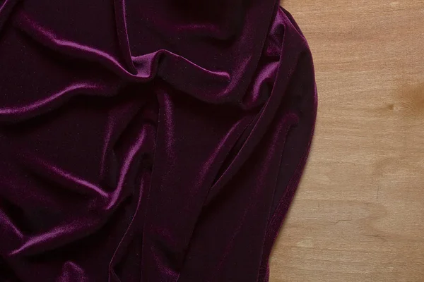 Tela Terciopelo Púrpura Sobre Una Superficie Madera —  Fotos de Stock