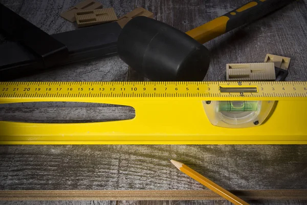 Instrumenty dla instalacji podłogi laminowanej — Zdjęcie stockowe
