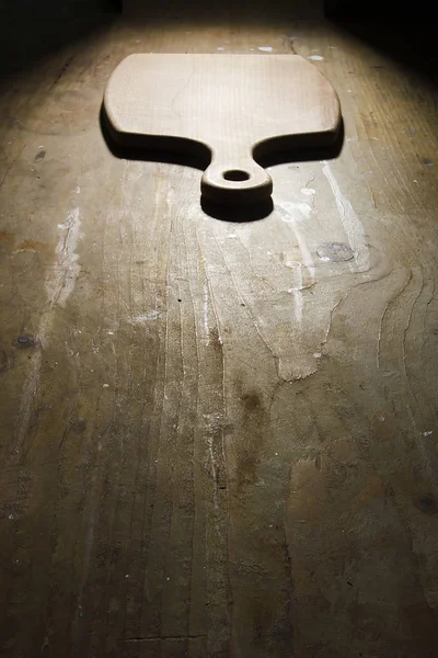 Cutting Board on the kitchen table — Stock Photo, Image