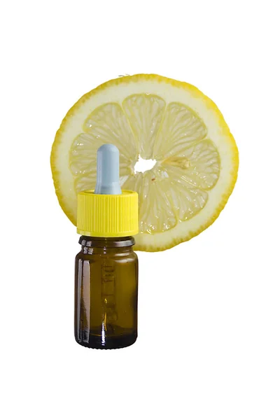 Eine Scheibe Zitrone und eine Flasche Medizin — Stockfoto