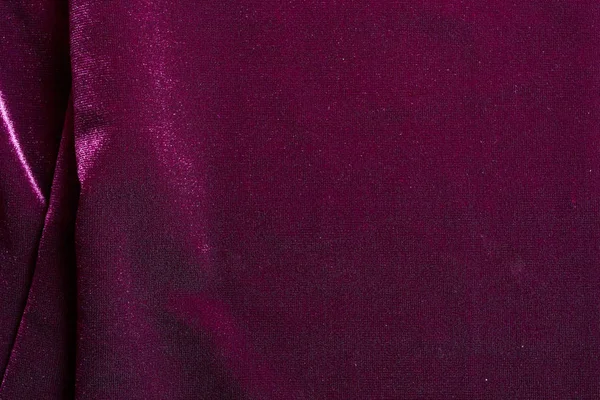 Hintergrund aus violettem Stoff — Stockfoto