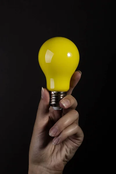 Hand with light bulb — Stock Photo, Image