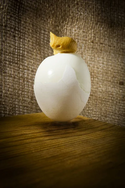 Boiled egg with mustard — Stock Photo, Image