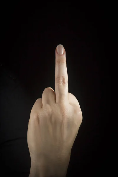 Mano con el dedo medio levantado — Foto de Stock