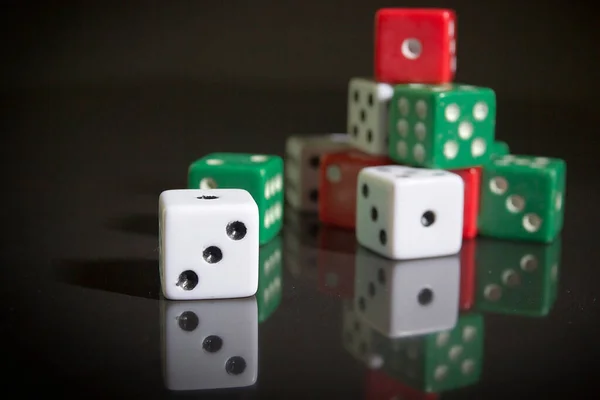 Multi Colored Dice Black Reflective Surface — Stock Photo, Image