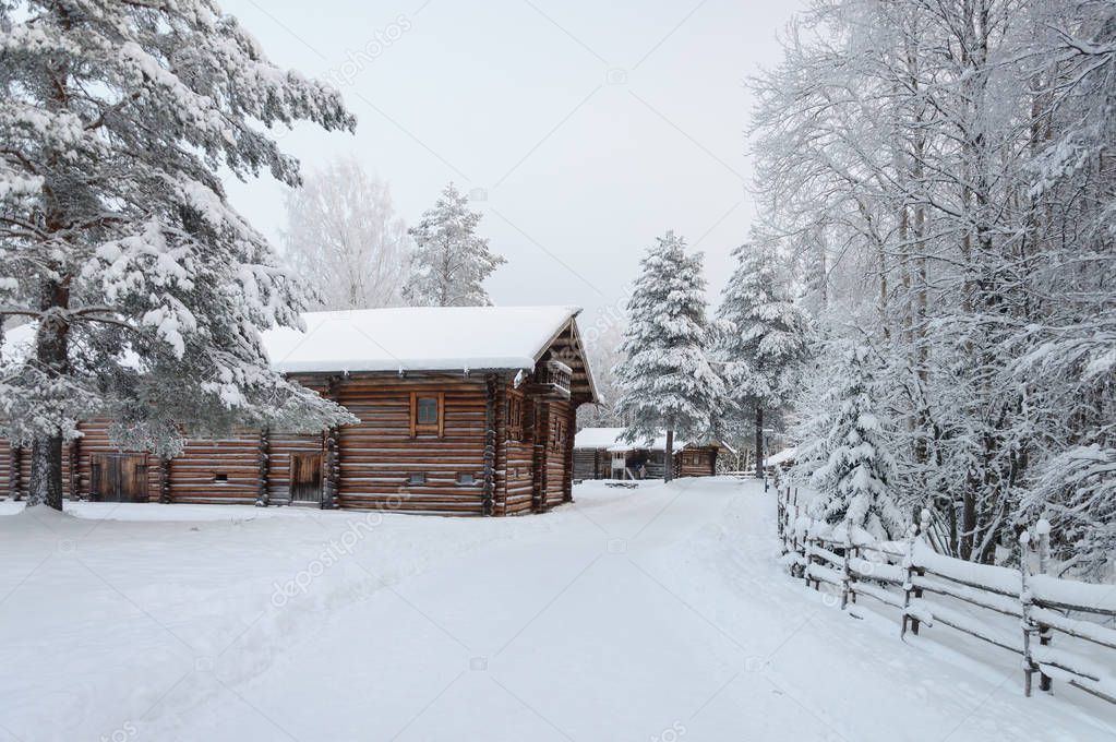 Old wooden houses in Northern Russian village. Tourist complex 