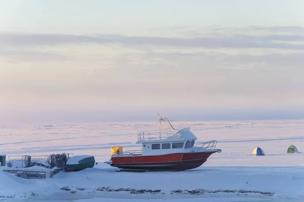 Motorboat on the riverbank in winter — Stock Image Motorboat on the riverbank in winter Stock Photo