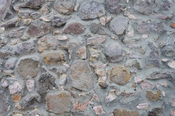 Achtergrond van grijze stenen muur — Stockfoto