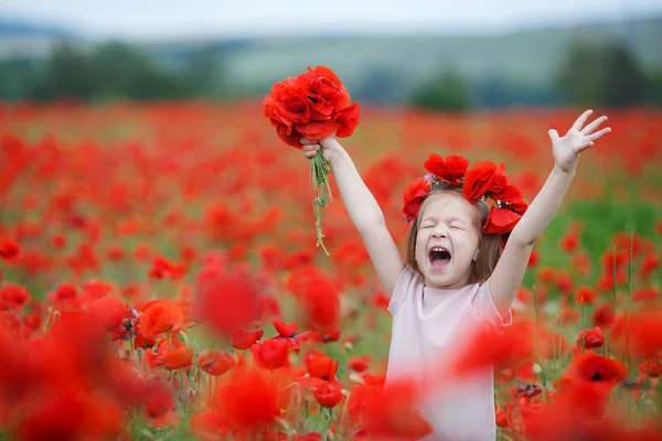 Little Girl Red Wreath Fresh Flowers Walking Poppy Field Sunny — Stock Photo, Image