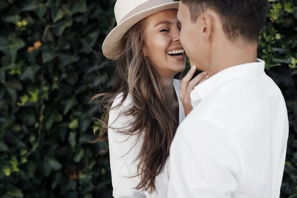 Lifestyle engagement photo session young man and woman near yachts, couple in the city — Stock Photo, Image