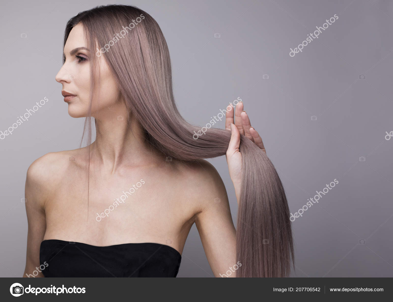 Sexy Profile Woman Holding Her Perfect Strong Purple Blonde Hair