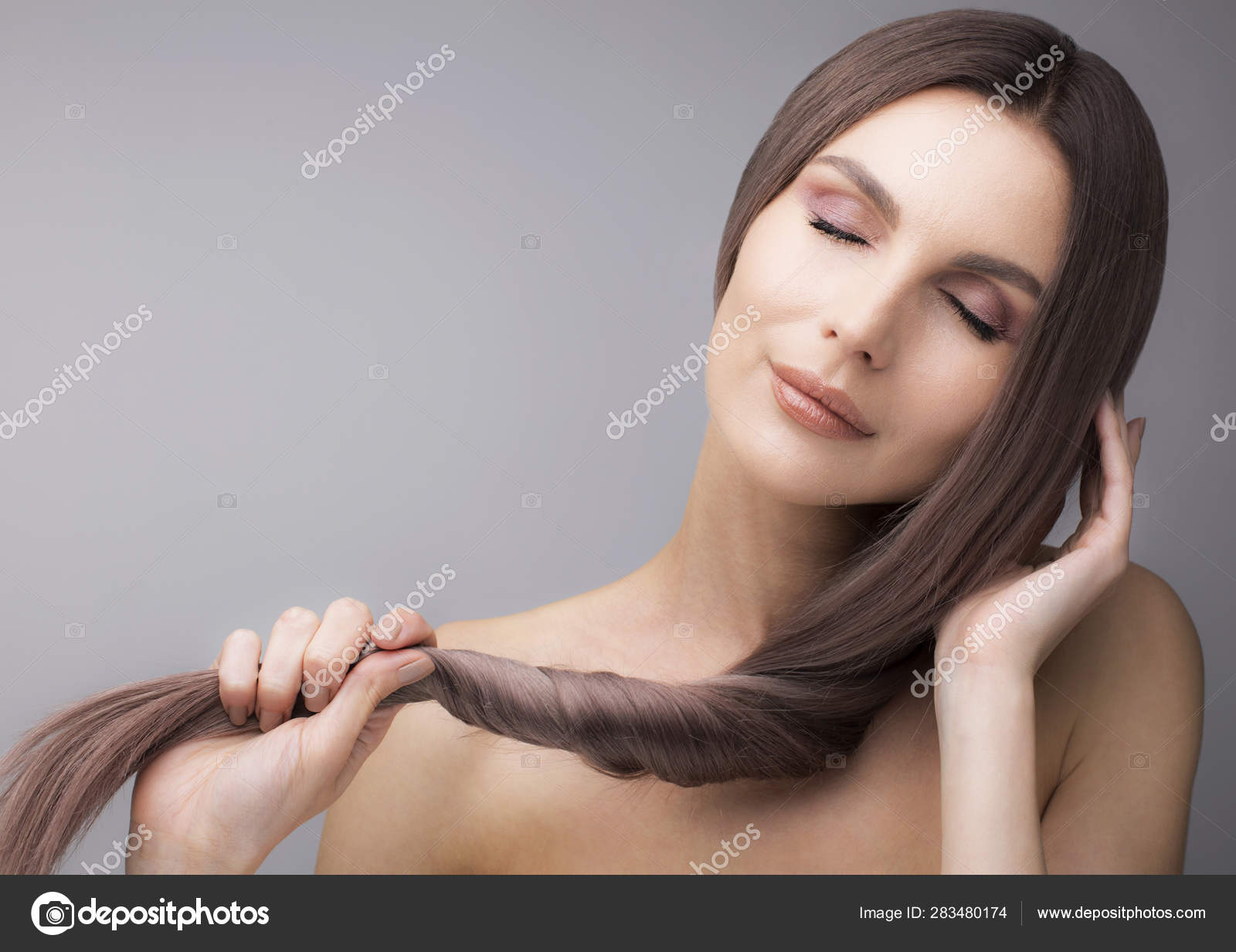 Horizontal Shot Of A Girl With Strong Purple Hair Stock Photo