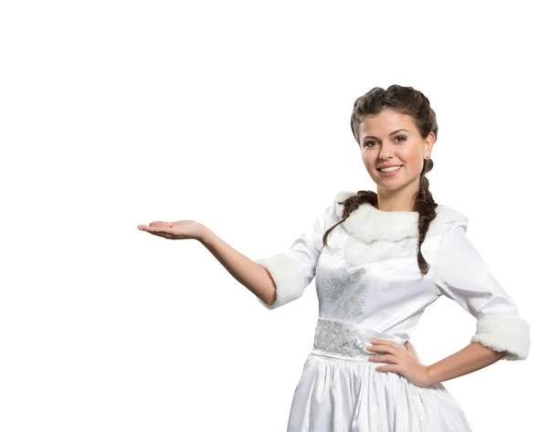 Ragazza Indica Qualcosa Con Movimento Della Mano Foto Isolata Sfondo Immagine Stock