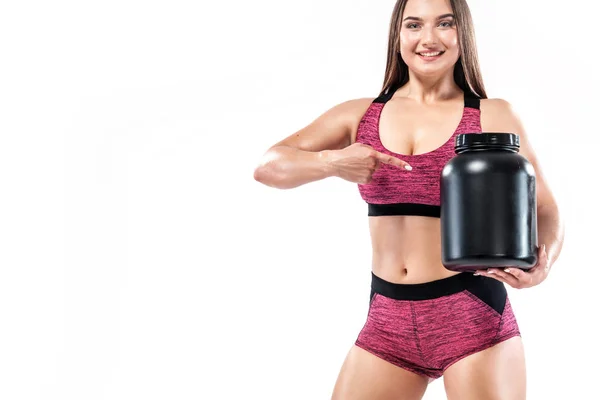 Atleta joven atleta deportiva de fitness muscular feliz y saludable con un frasco de nutrición deportiva: proteína, ganadora y caseína — Foto de Stock