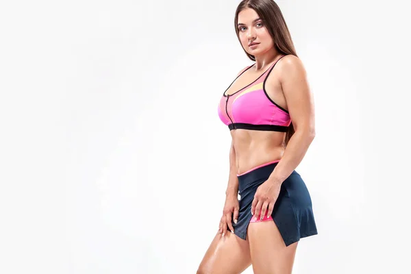 Storlek plus fitness kvinna idrottsman och bodybuilder sport kläder för gymträning. — Stockfoto