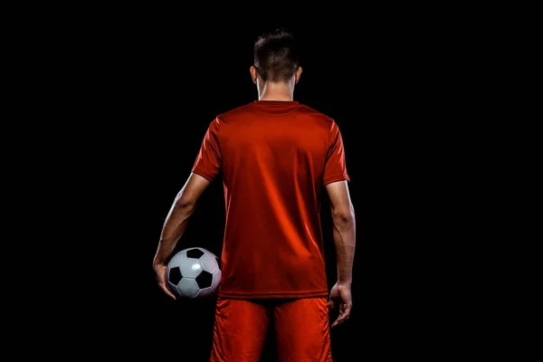 Teenager - Fußballer. Junge in Fußballsportbekleidung nach einem Spiel mit Ball. Sportkonzept. — Stockfoto