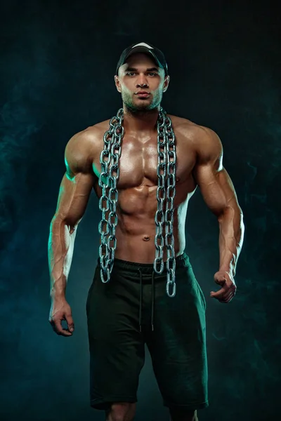 Muscular fitness sports man, atlete with chains in fitness gym. — Stock Photo, Image