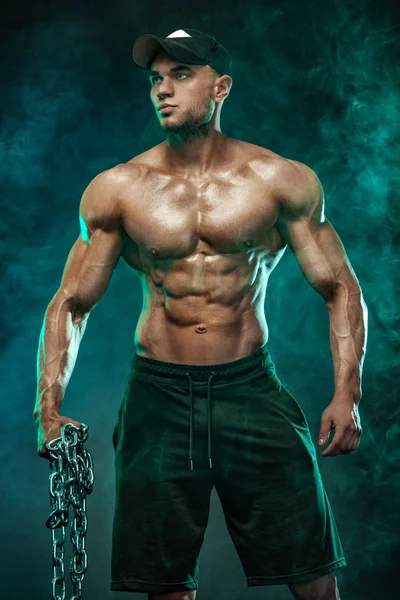 Muscular fitness sports man, atlete with chains in fitness gym. — Stock Photo, Image