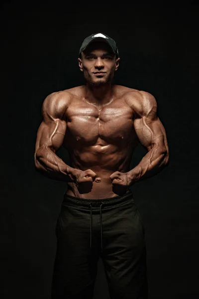 Bodybuilding competitions on the scene. Man sportsmen bodybuilder physique and athlete. Fitness motivation. — Stock Photo, Image