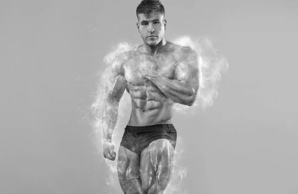 Brutal starke muskulöse Bodybuilder Athlet Mann, der Muskeln auf weißem Hintergrund aufpumpt. Workout Bodybuilding Konzept. Schwarz-Weiß-Foto. — Stockfoto