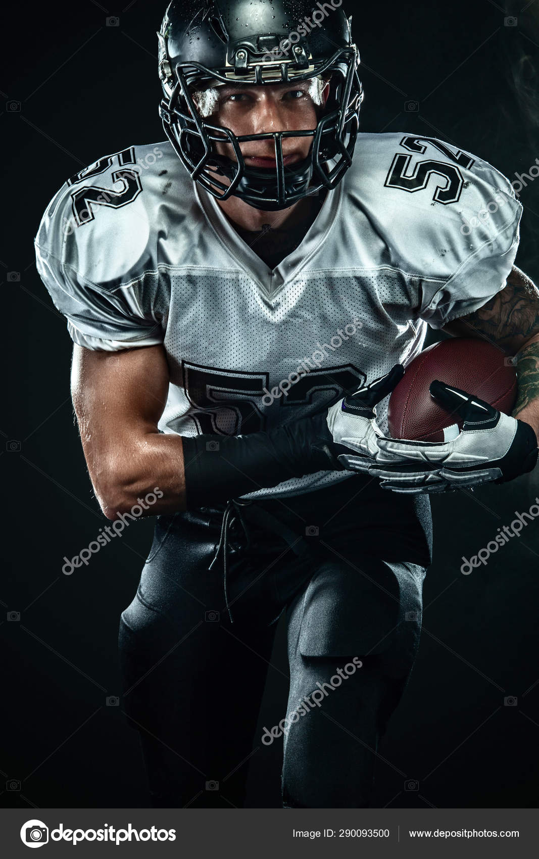 American Football Player Sportsman In Helmet On Black Background With Smoke Sport And Motivation Wallpaper Stock Photo C Mikeorlov