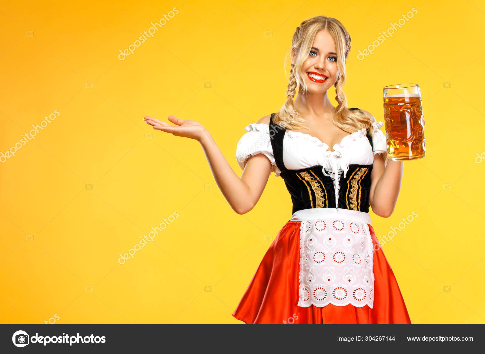 oktoberfest girl carrying beer
