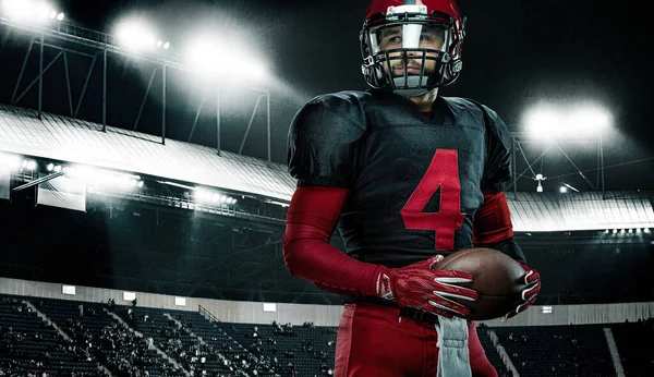 Jogador de futebol americano, atleta desportista de capacete vermelho no fundo do estádio. Esporte e motivação papel de parede. — Fotografia de Stock