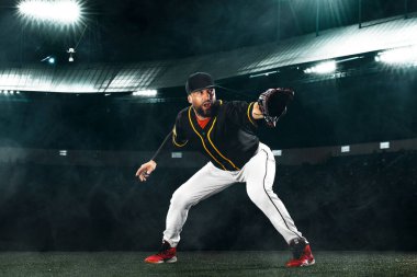 Porfessional baseball player on grand arena. Ballplayer on stadium in action. clipart