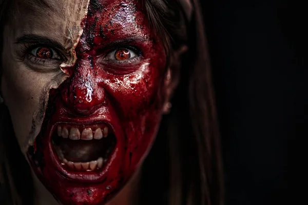 Zombie makeup on Halloween 2020. Creative art make-up for eve of All Saints Day party. Creepy bloody face. Close-up portrait of horrible woman. Horror. — Stock Photo, Image