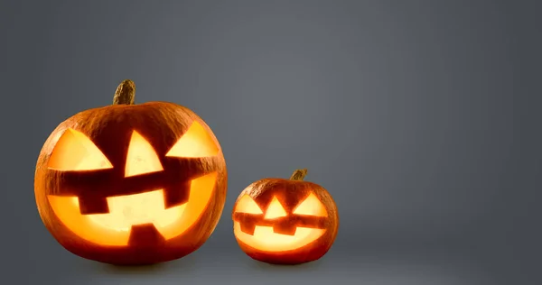 Halloween gloeiende pompoenen — Stockfoto