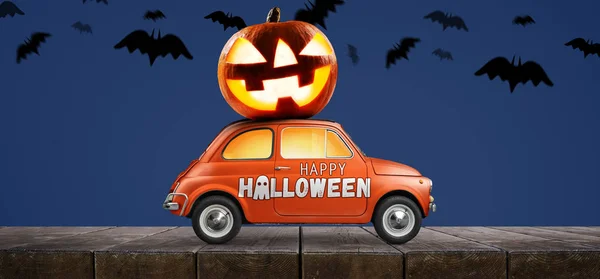 Halloween pompoen op auto — Stockfoto